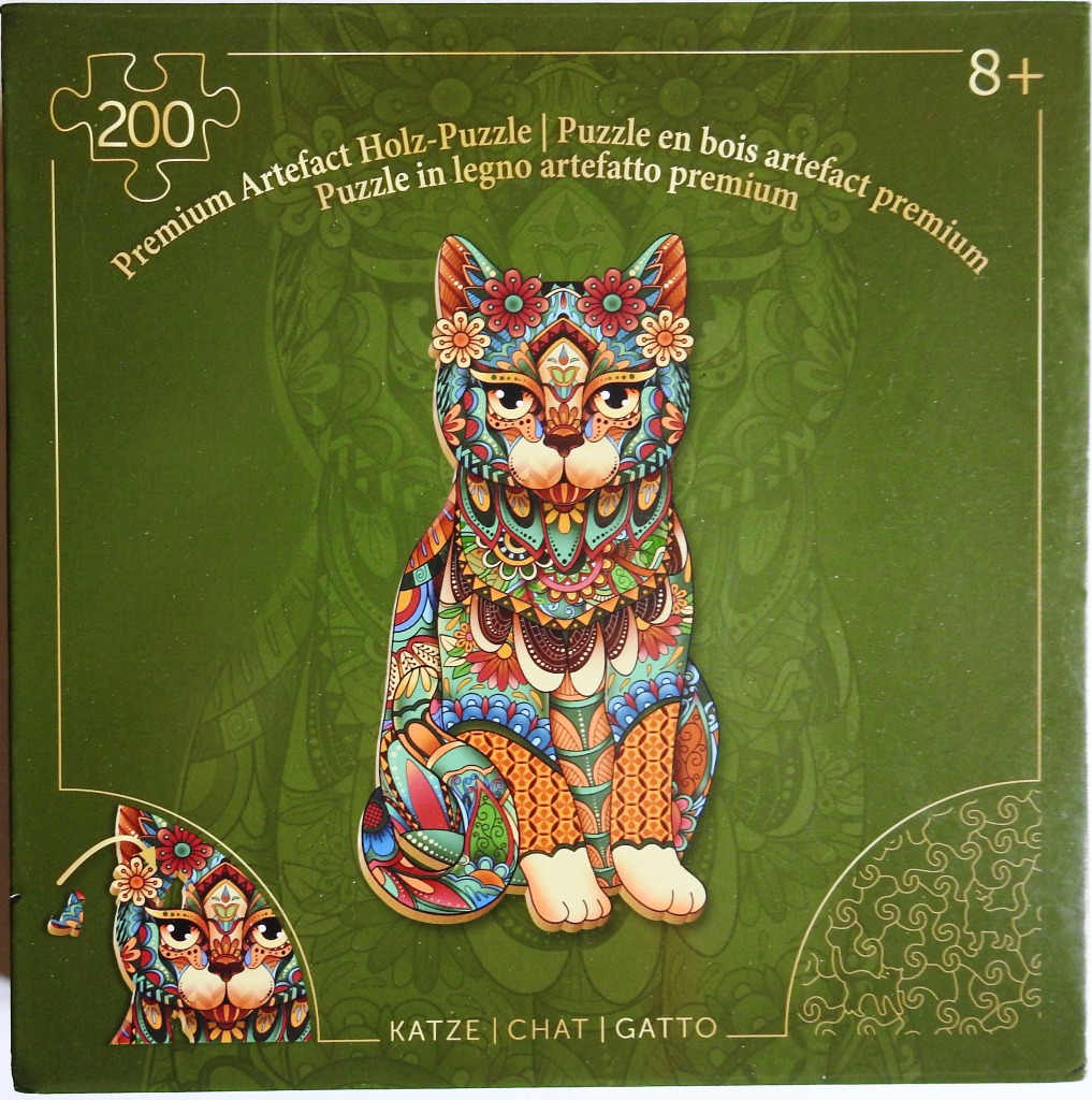 An illustration of a cat filled with intricate, colorful mandala and floral patterns against a dark green background.