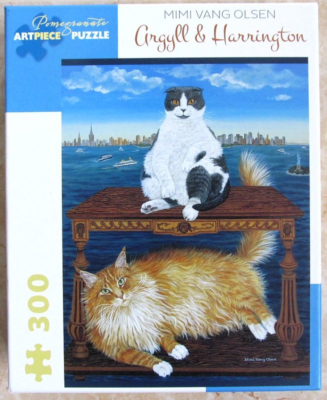 A painting of two cats: a black and white cat sitting on a wooden table, and a long-haired ginger cat underneath it.