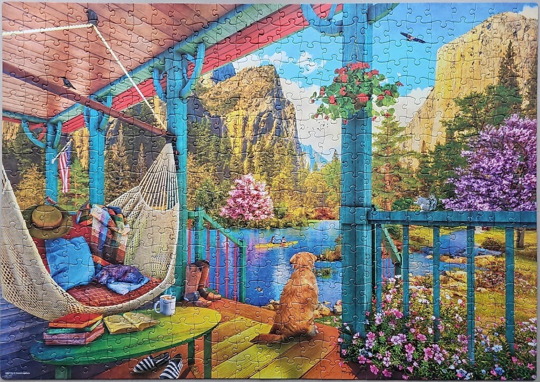 A golden retriever sits on a porch looking out over a mountain lake in a vibrant landscape illustration.