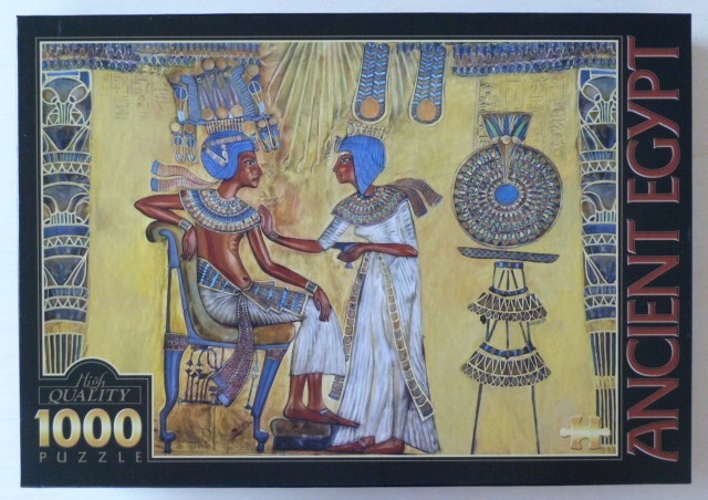 Illustration of an Egyptian pharaoh seated on a chair while being attended to by a woman.