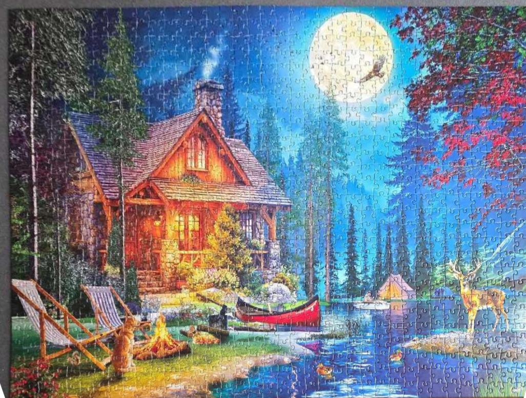 A cozy log cabin glowing at night by a lake under a full moon with a fire, a canoe, and wildlife.