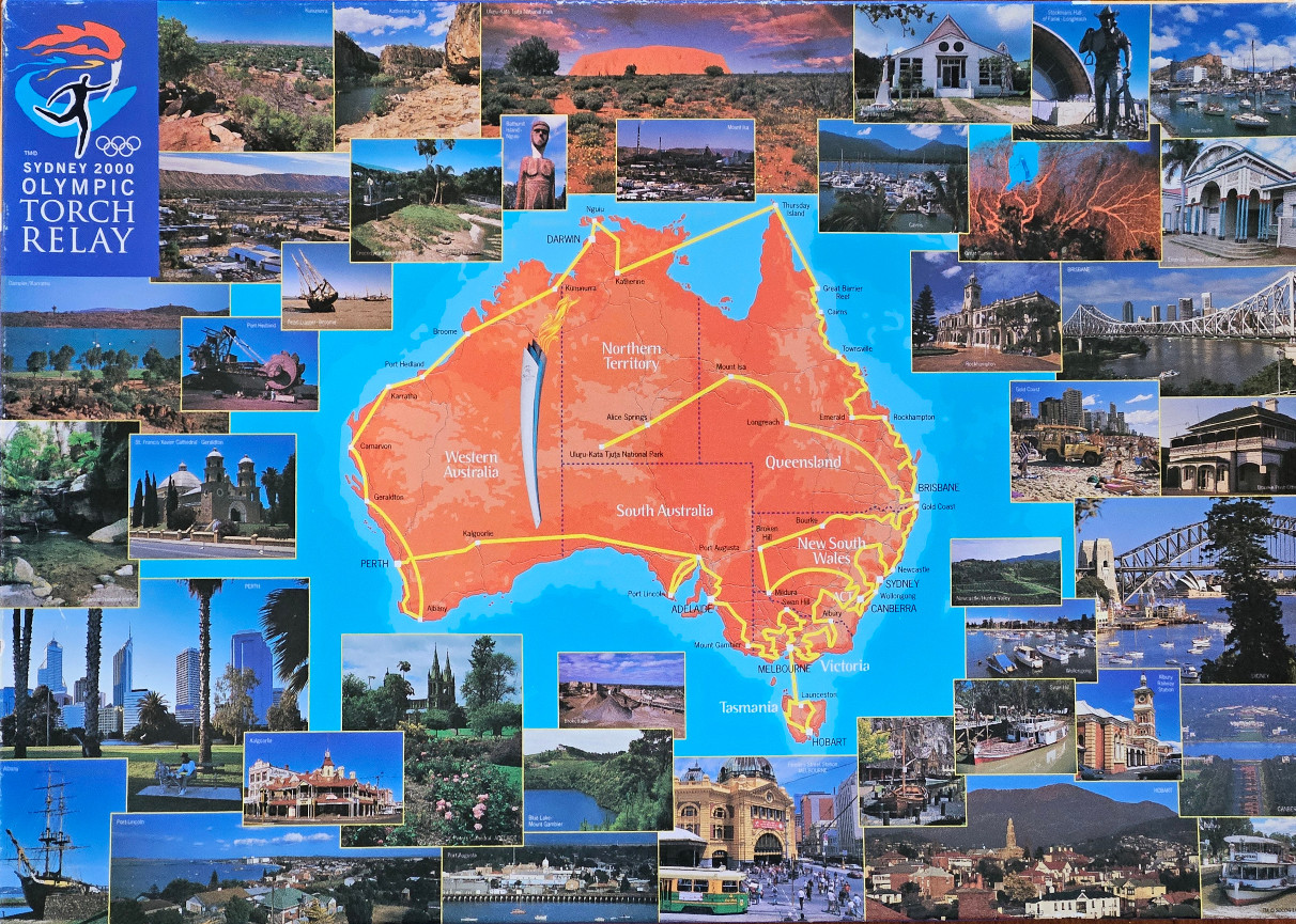 A map of Australia surrounded by photographic vignettes depicting various landmarks and landscapes of the country.