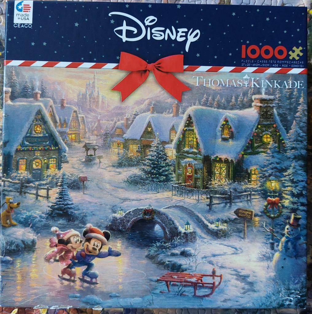 Mickey and Minnie Mouse ice skating in a snowy, festive village scene at dusk