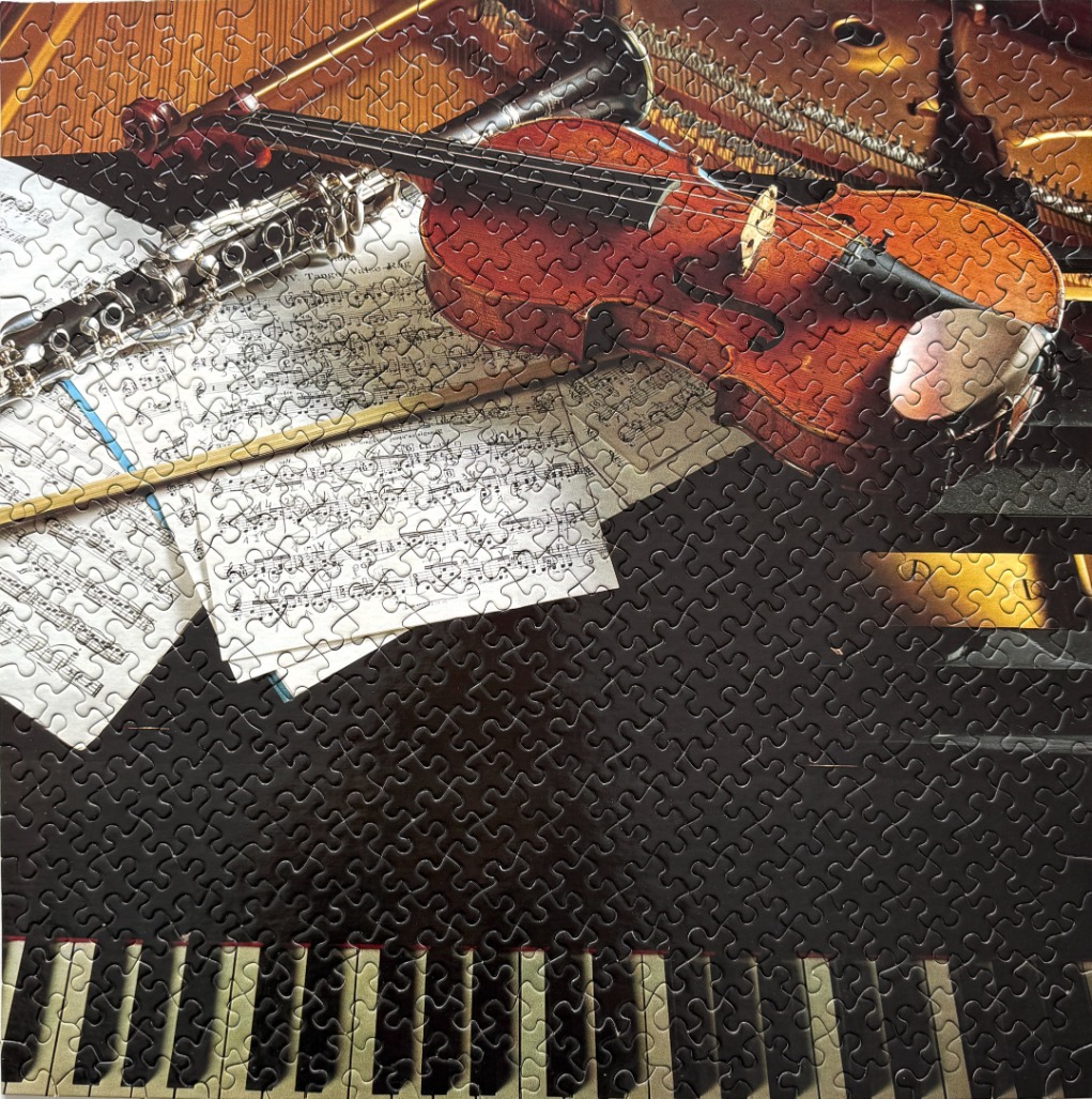 A still life featuring a violin, a clarinet, and sheet music resting on a grand piano.