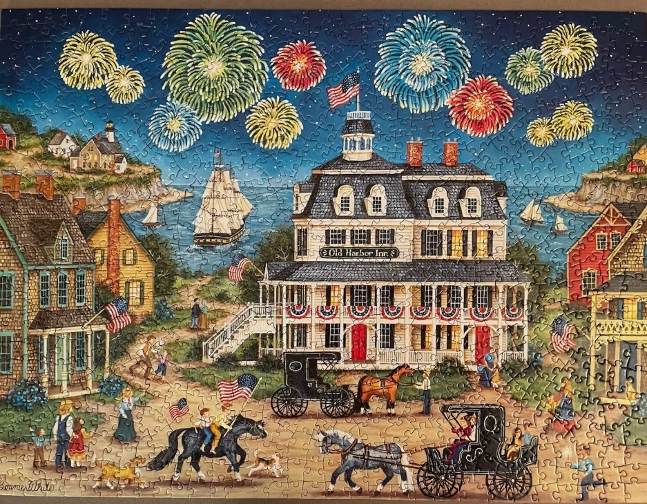 Folk art scene of the Old Harbor Inn at night with fireworks.
