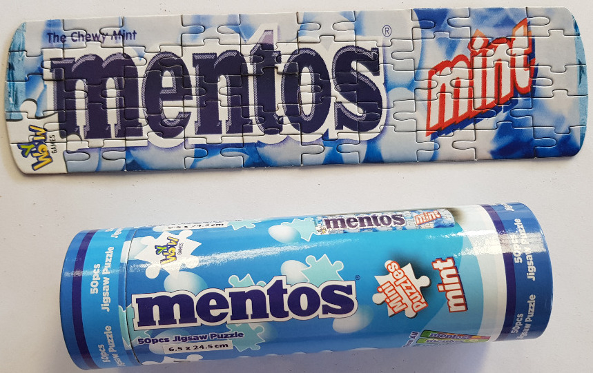 A rectangular puzzle featuring the Mentos Mint logo set against a blue and white background.