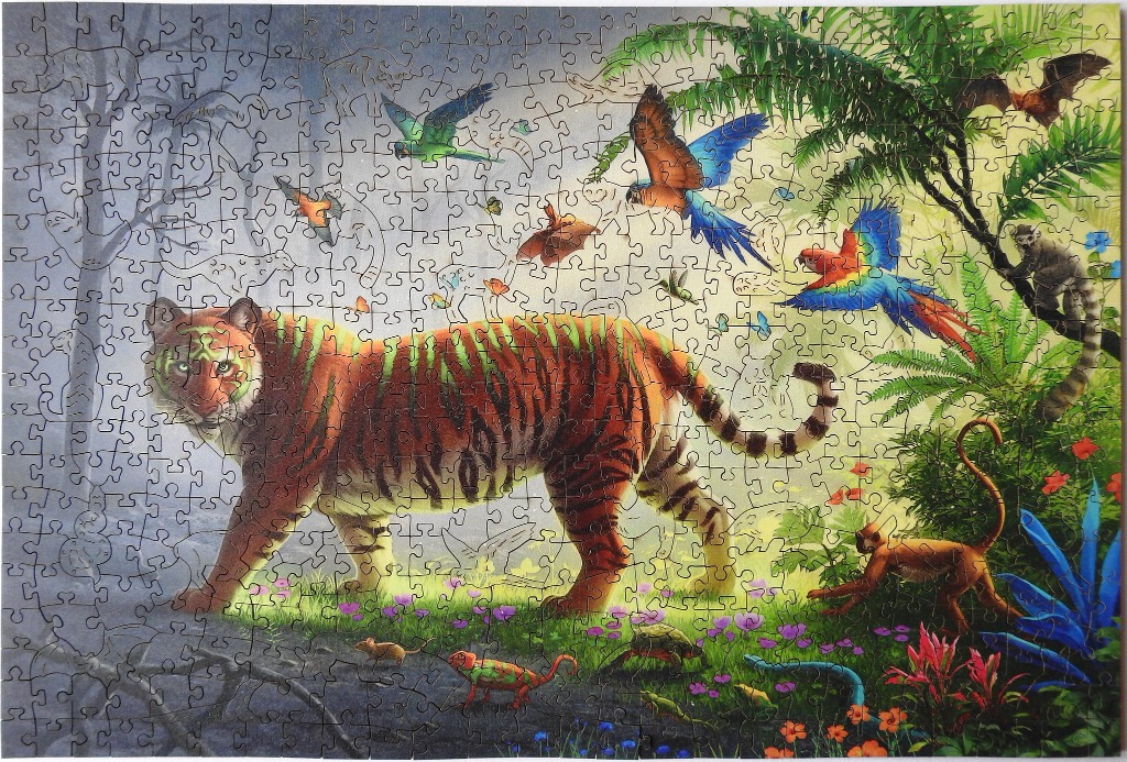 A tiger walking through a jungle transition from a grey-toned sketch on the left to vibrant, full-colour wildlife.