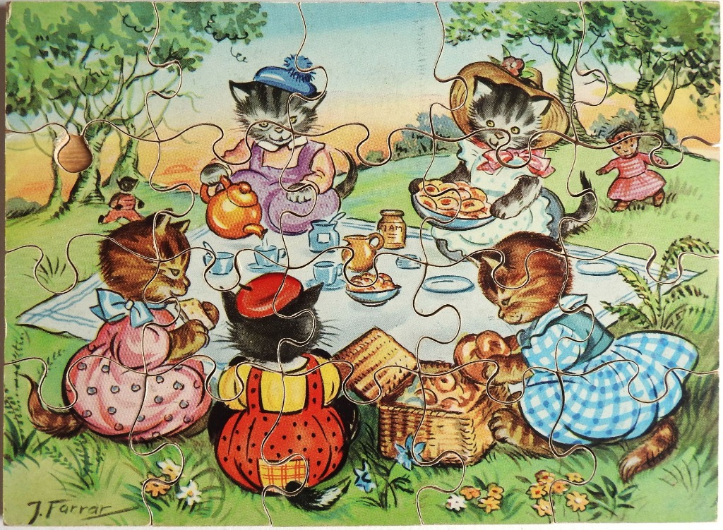 Vintage illustration of five kittens having a tea party on a picnic blanket in a garden.