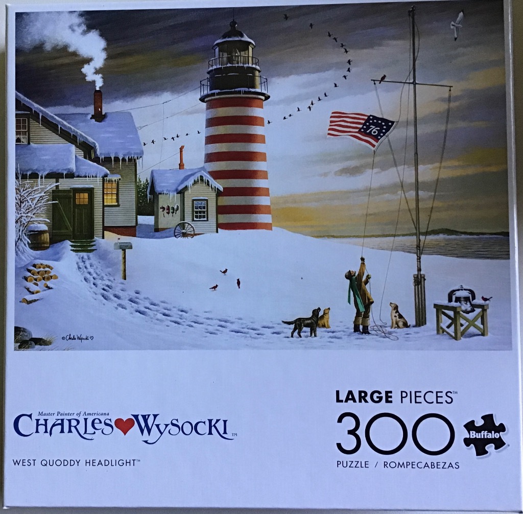 A snowy Americana scene featuring a lighthouse, a flag, and a person with dogs by the sea.