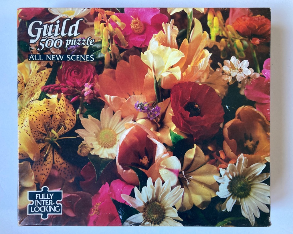 A lush, vibrant close-up of a dense floral bouquet featuring lilies, tulips, and daisies.