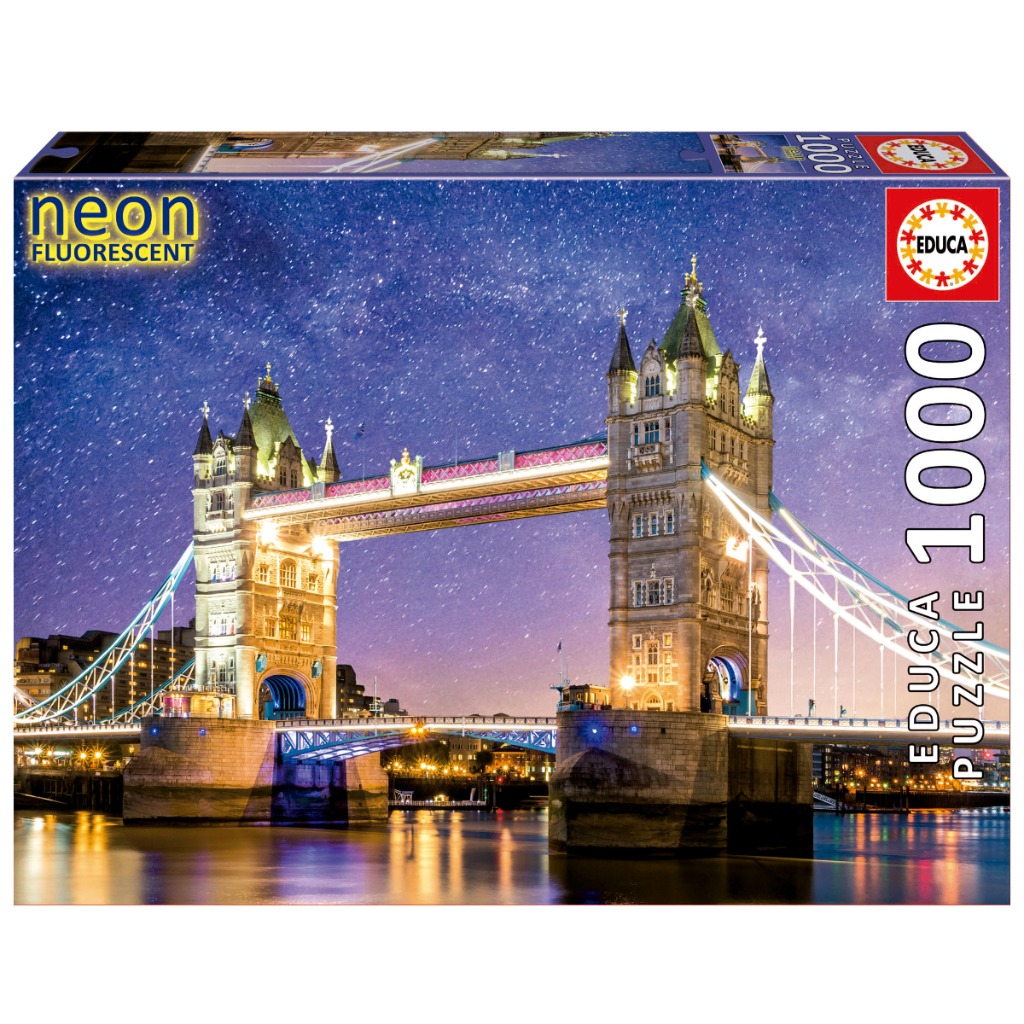 A night photograph of London's Tower Bridge glowing under a dense starry sky.