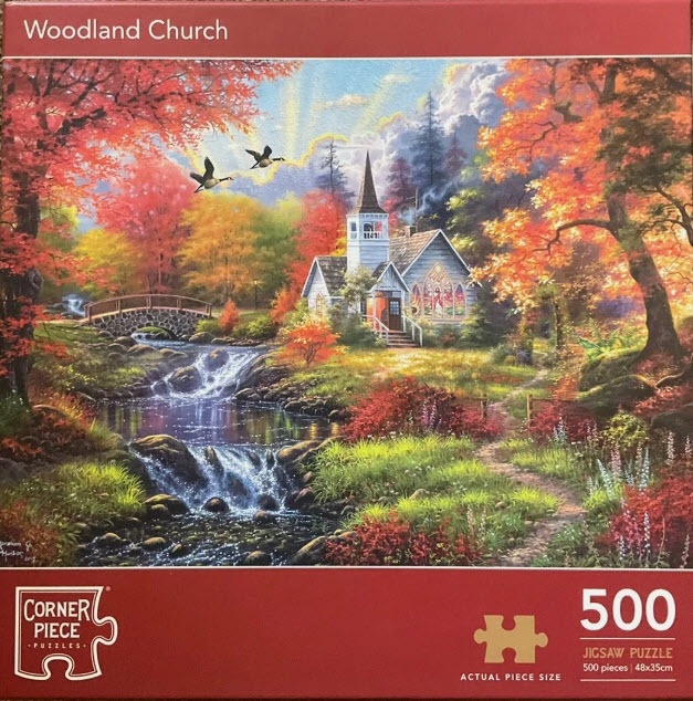 A peaceful woodland scene featuring a church, a bubbling stream, and autumn trees.