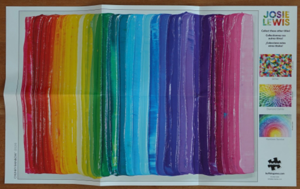 A series of vertical, thick, impasto-style paint stripes forming a spectrum from red on the left to pink on the right.