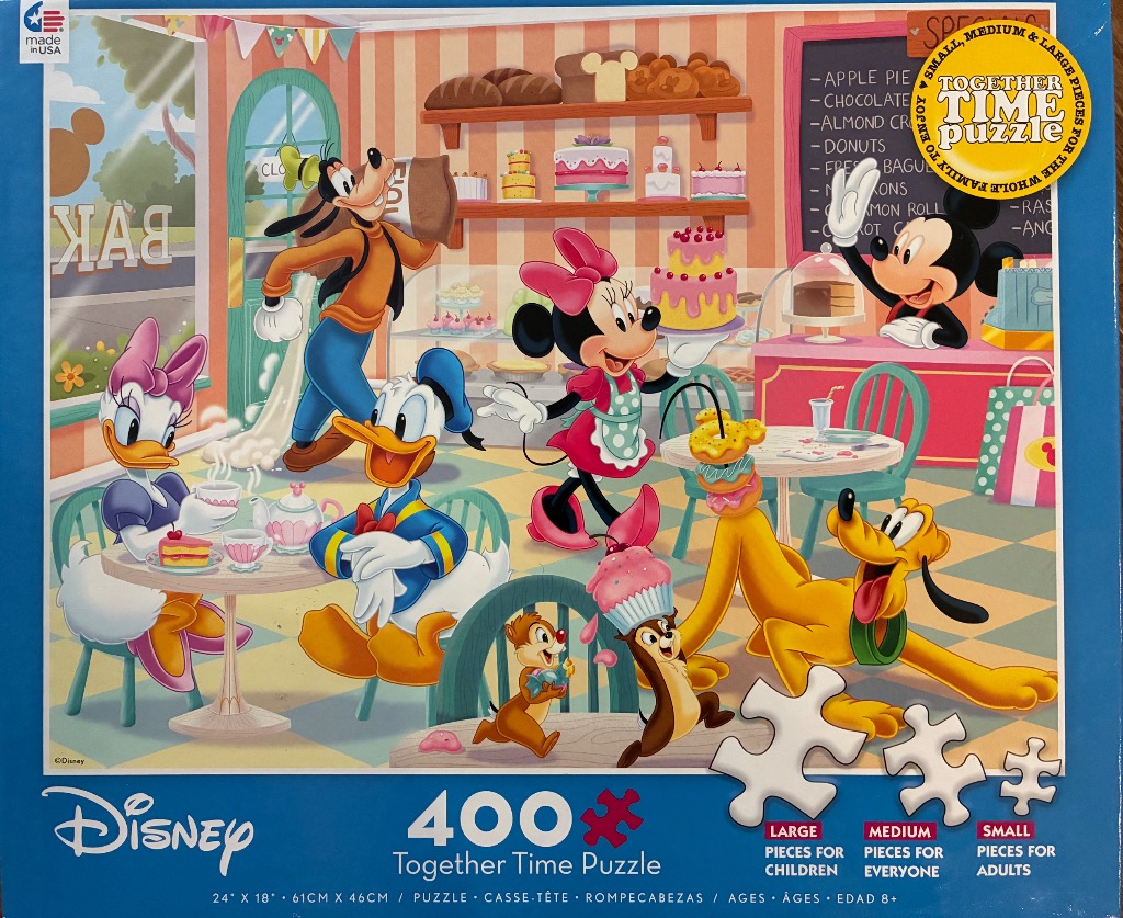 Mickey Mouse and friends in a cheerful cartoon bakery.