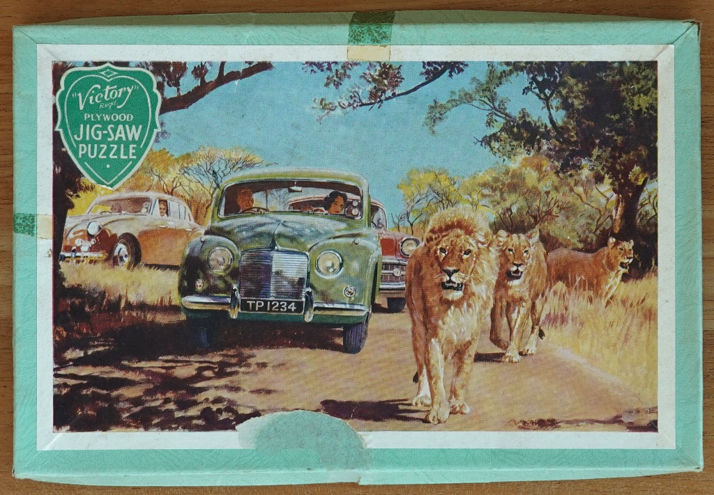 Vintage illustration of a safari scene with a green car driving toward a pride of lions on a dirt road.