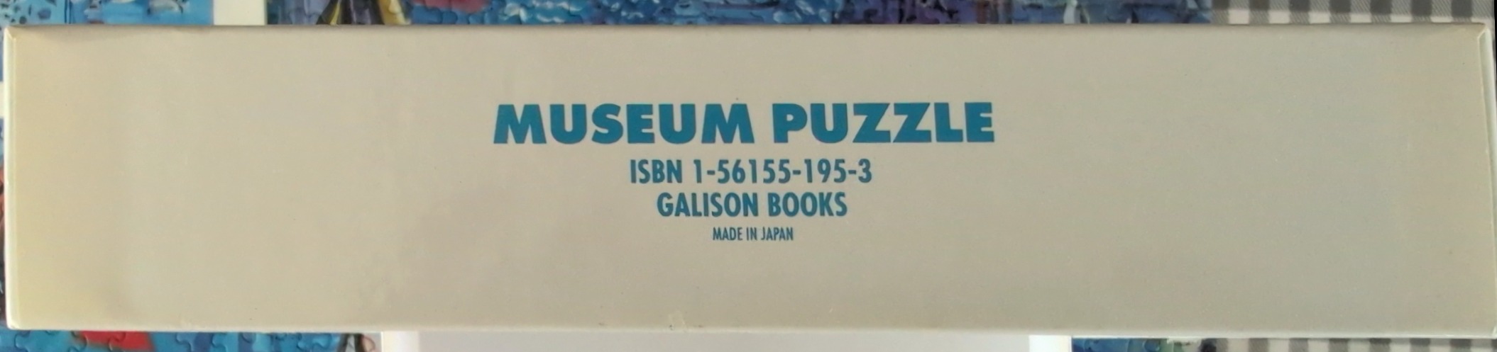 Museum Puzzle box with blue text "MUSEUM PUZZLE", ISBN, and "MADE IN JAPAN".