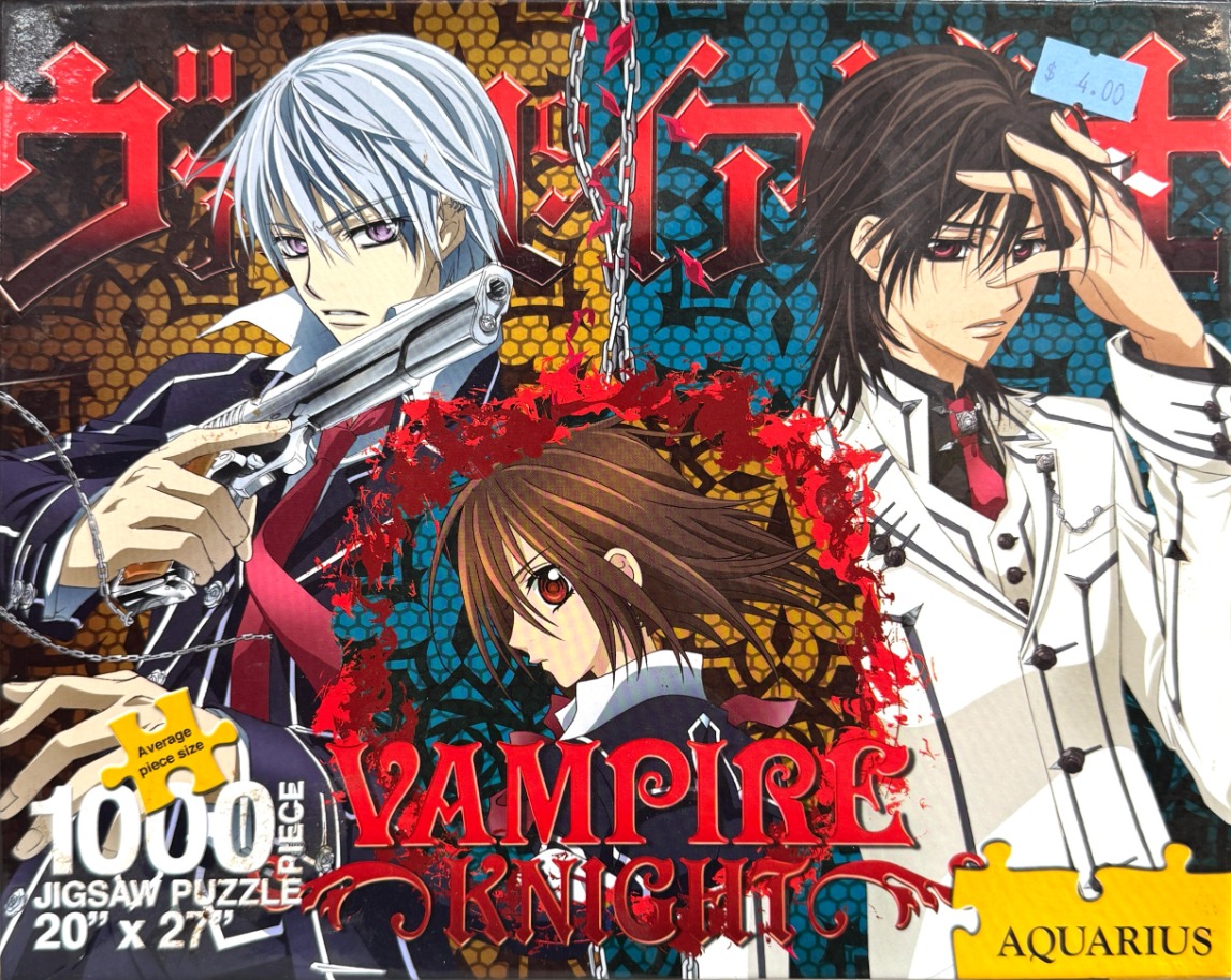 Anime-style illustration of three characters from Vampire Knight with red text overlay.