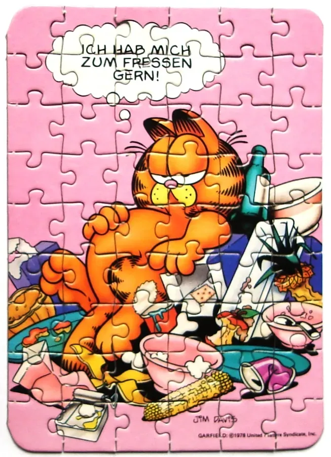 Garfield the cat surrounded by food with a German speech bubble on a pink background.