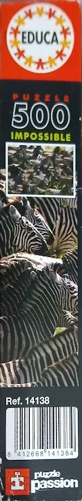 A dense photograph of a large herd of zebras with overlapping black and white striped patterns.