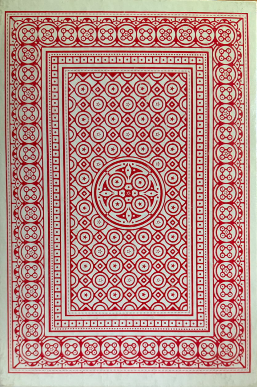 A red and white geometric card back design with concentric borders and a circular mandala-style center motif.