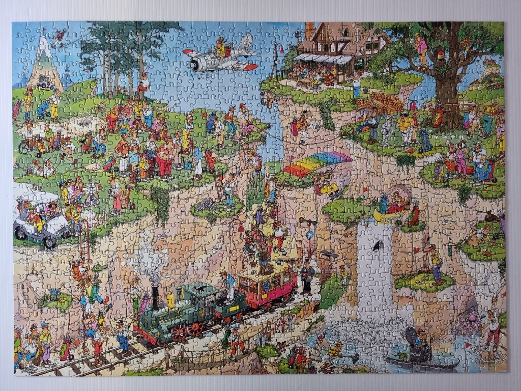 Cartoon illustration of a chaotic golf course built into cliffs, mountains, and a train track