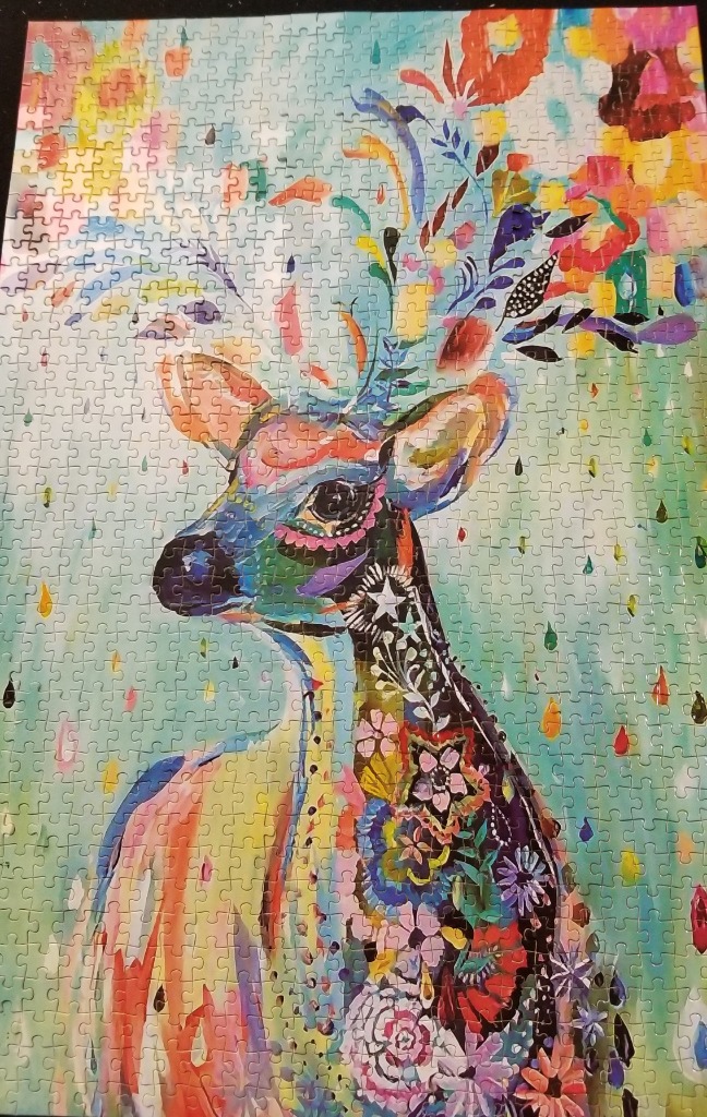 Abstract art of a deer with colorful floral antlers against a turquoise rain-streaked background.