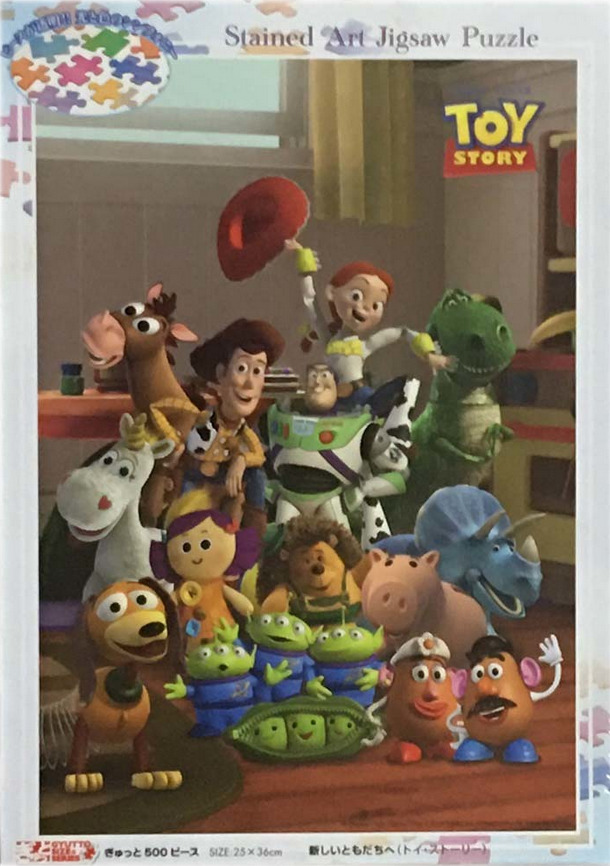 A group of Toy Story characters including Woody, Buzz, Jessie, and others posing in a bedroom.