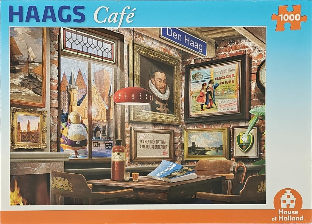 A cozy interior of a cafe in The Hague featuring brick walls, framed portraits, and a view of a city square.