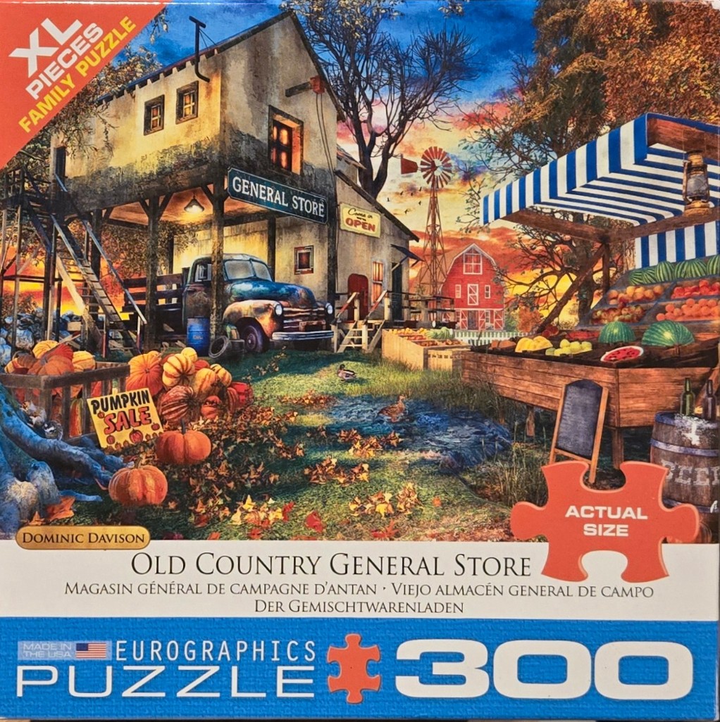 A rural general store with a vintage truck, pumpkin patch, and produce stand at sunset.