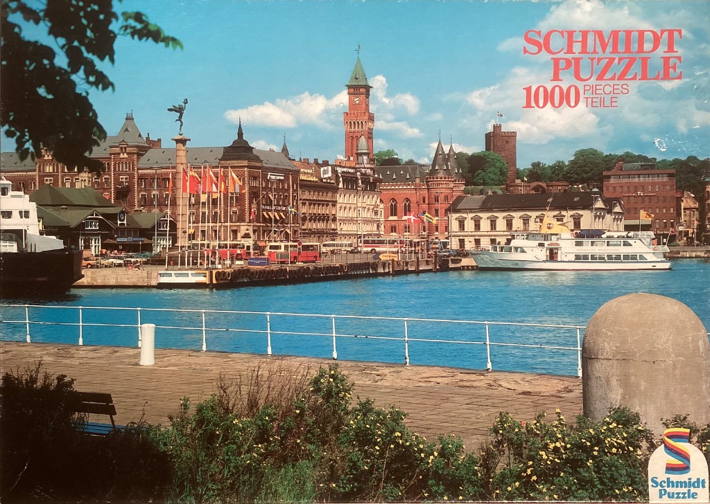 A sunny waterfront scene in Helsingborg, Sweden, featuring historical architecture, a harbour, and a docked ferry.