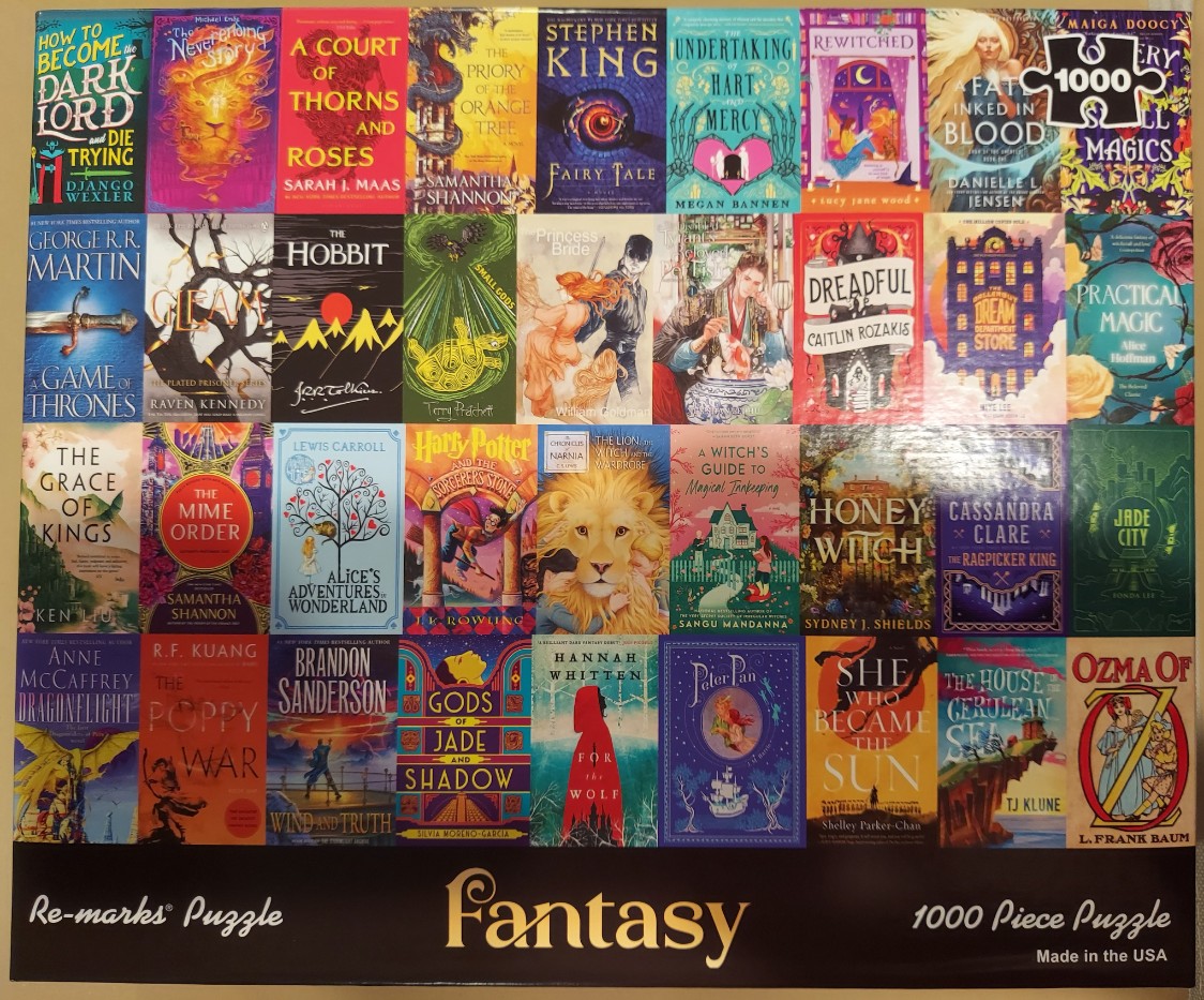 A collage of 35 diverse fantasy book covers arranged in a five-by-seven grid.