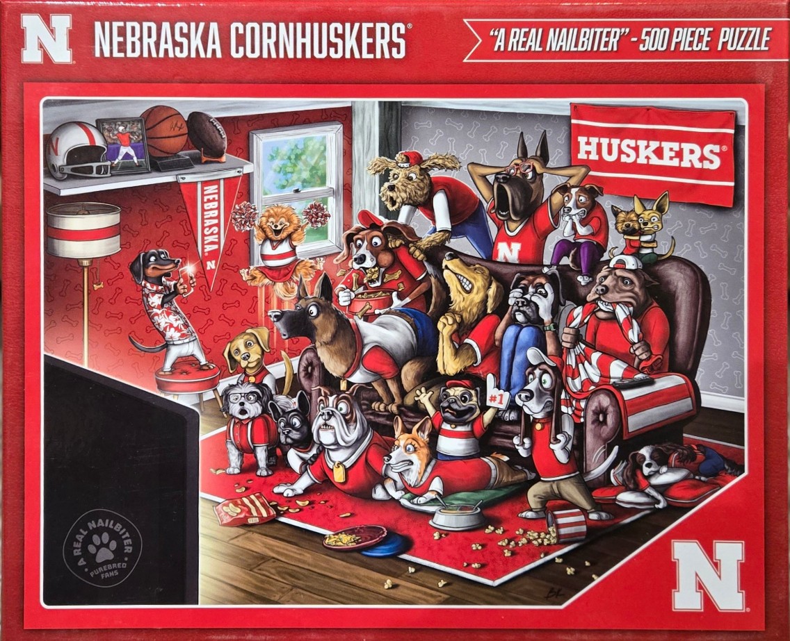 Cartoon illustration of many dogs wearing red sports jerseys watching a football game in a living room.