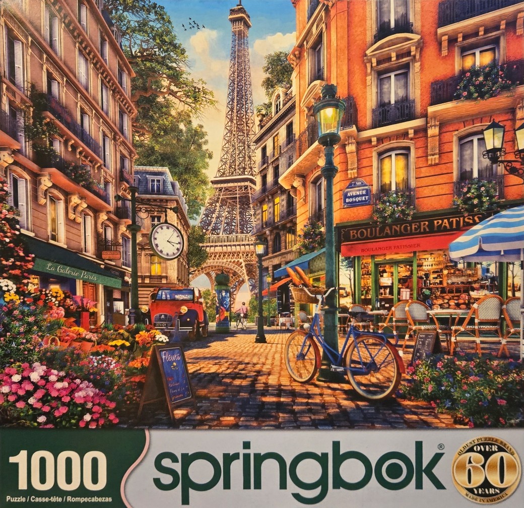 Illustration of a Parisian street scene with the Eiffel Tower in the background, a bakery, and a bicycle.