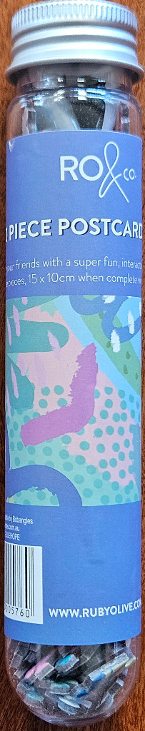 Abstract graphic pattern with pastel shapes and dots on a periwinkle blue background.