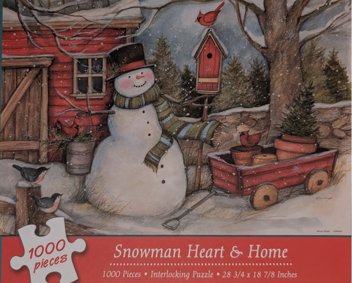 A whimsical illustration of a snowman wearing a hat and scarf standing beside a red barn, a birdhouse, and a small wagon.