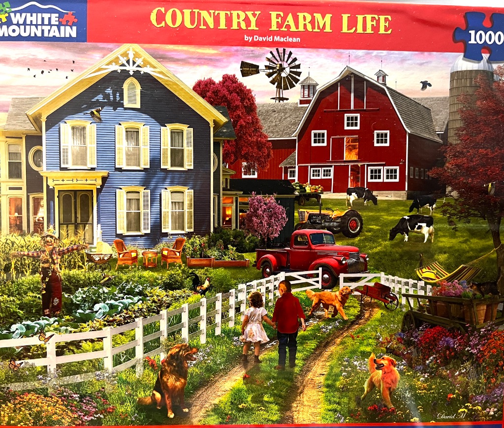 A peaceful farm scene featuring a blue farmhouse, a red barn, a garden with a scarecrow, and children playing with dogs.