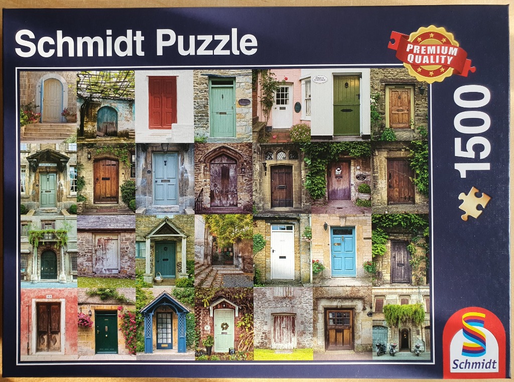 A collage of 25 different vintage-style wooden and painted doors set in stone cottages and historic buildings.