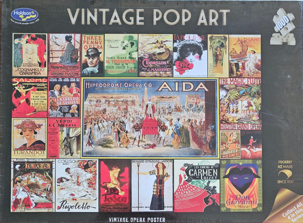 A collage of vintage opera posters featuring a large central Aida illustration.