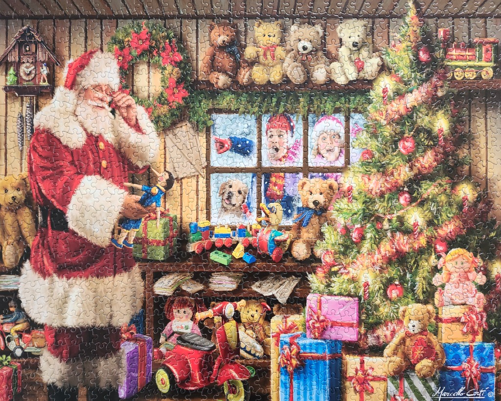 Santa Claus in his workshop surrounded by toys, a Christmas tree, and children looking through a window.