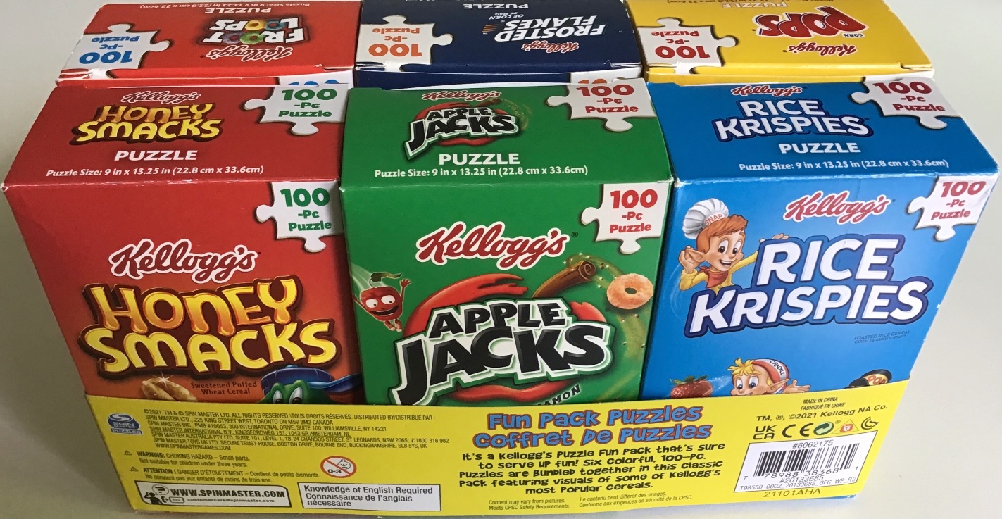 A collection of six colorful cereal boxes featuring cartoon mascots and brand logos.