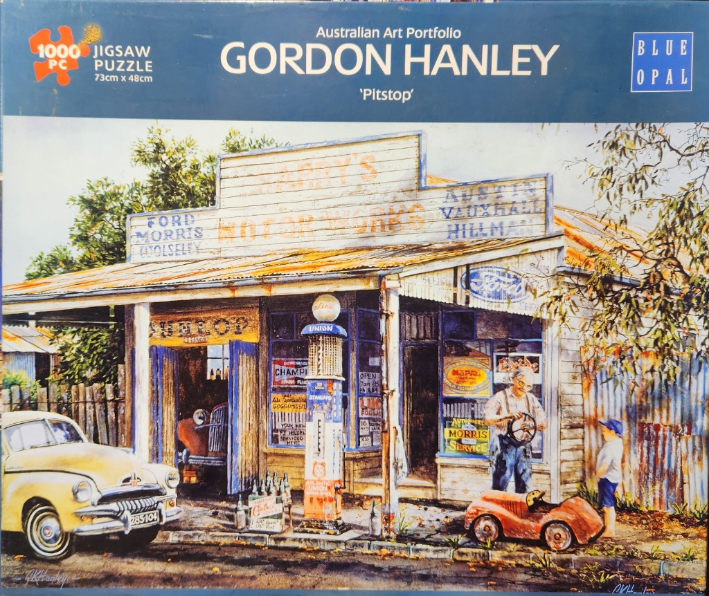 A nostalgic painting of an old rural auto repair shop titled Pitstop with a yellow vintage car and an older mechanic.