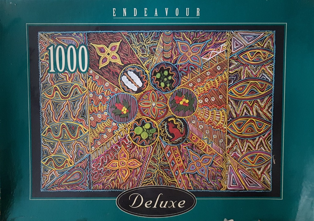 A detailed Aboriginal-style dot painting featuring geometric patterns and circular motifs in warm earthy tones.
