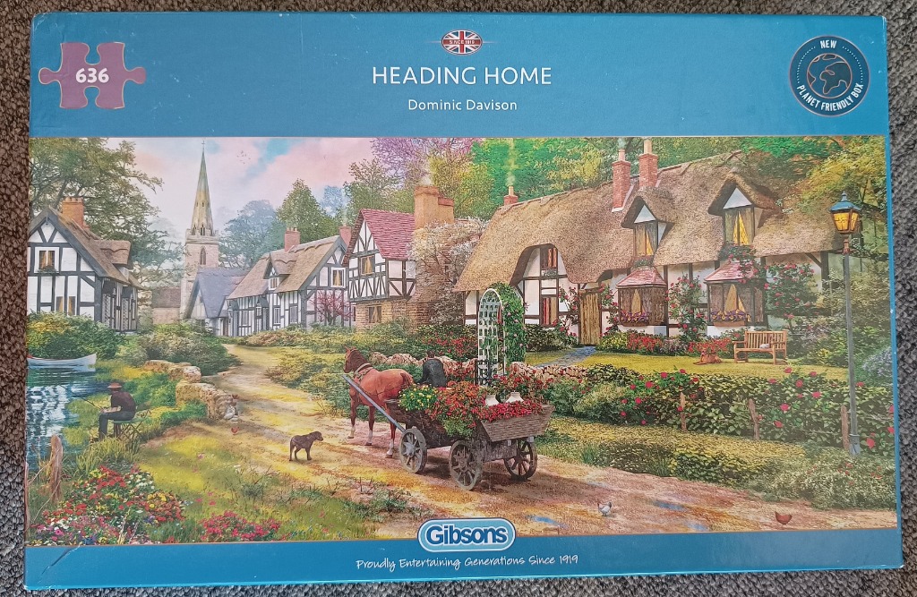 A peaceful English village scene with a thatched cottage, a horse-drawn cart, and a church steeple.