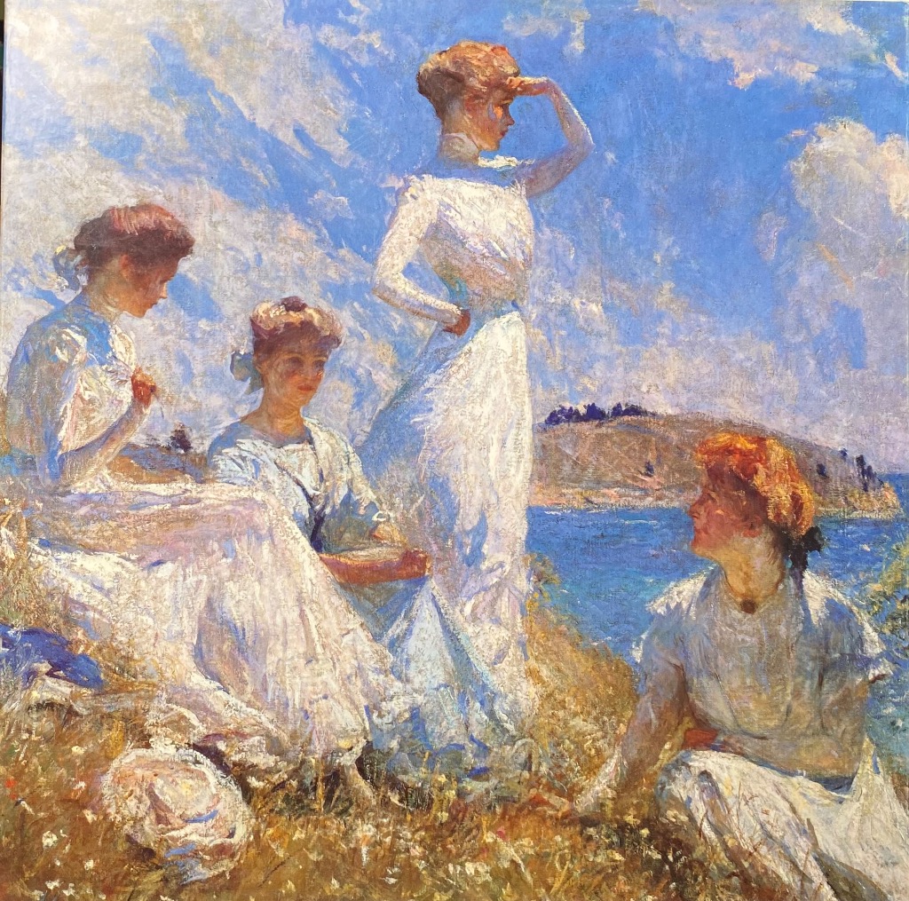An impressionist painting of four women in white dresses gathered on a grassy hillside overlooking a blue bay.