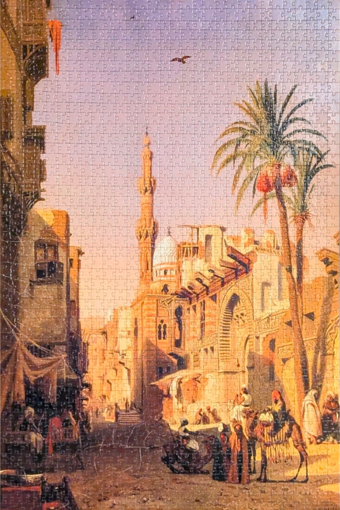 An orientalist painting of a sun-drenched Middle Eastern city street with a minaret, palm trees, and camel riders.