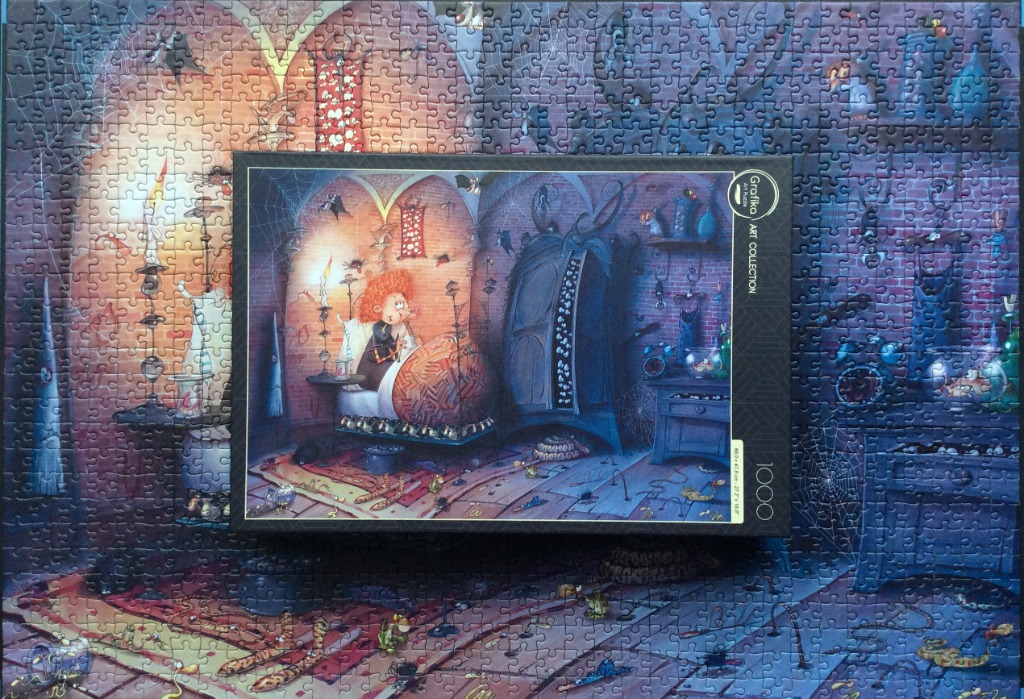 Whimsical illustration of a red-headed child sitting up in bed in a cluttered, dark room filled with magical items.