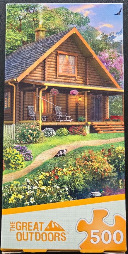 A cozy log cabin nestled in a vibrant garden landscape at twilight.