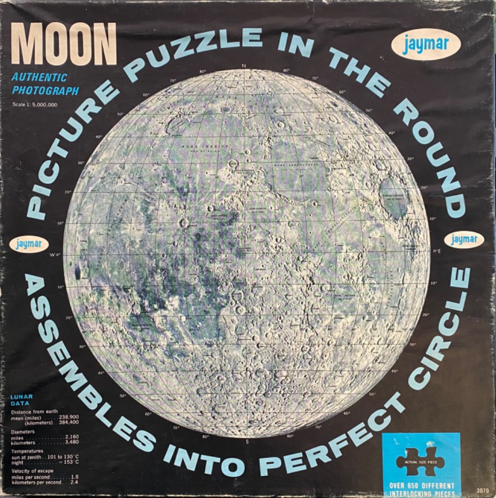 A detailed circular map of the moon with a grid overlay set against a black background.