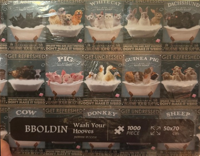 A collage of vintage-style advertisements featuring various animals in claw-foot bathtubs filled with bubbles.