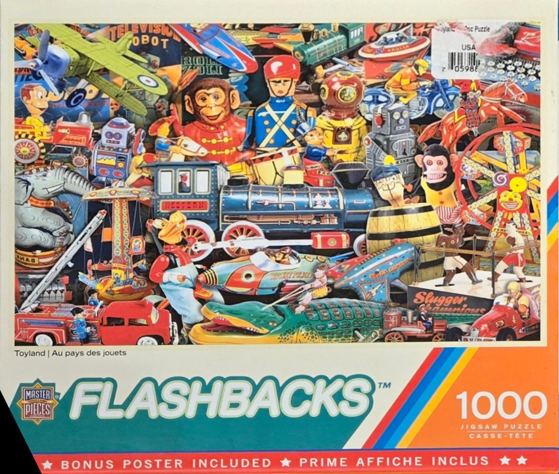 A dense, colorful collection of vintage tin lithograph toys including monkeys, a train, and various vehicles.